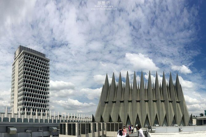 Budget Tour: Full Day Putrajaya, Batu Caves & Kuala Lumpur City - Masjid Besi, Millennium Monument, and the Moroccan Pavilion