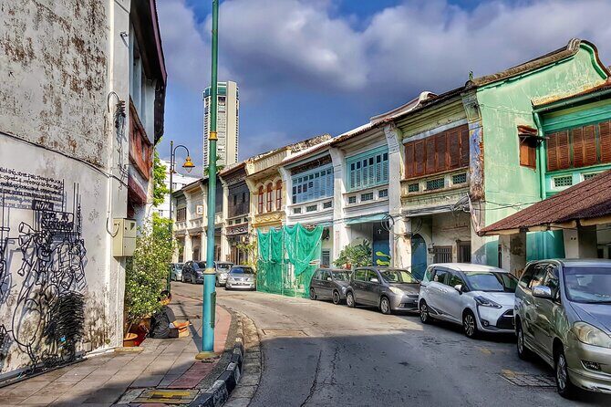 Georgetown And Penang City Highlights Half Day Tour - Dhammikarama Burmese Temple: a towering 8.2-meter standing Buddha