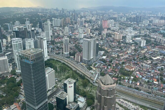 Kuala Lumpur City Tour with Petronas Twin Tower Admission Ticket - Merdeka Square area: Sultan Abdul Samad + big-city symbolism