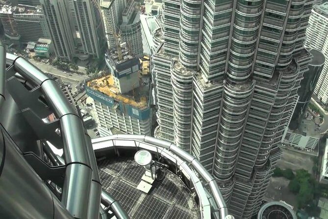 Kuala Lumpur City Tour with Petronas Twin Towers Entrance - The Moorish railway building: a quick stop with strong architecture