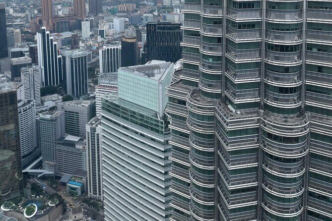Kuala Lumpur Full Day City Tour with Petronas Twin Tower Tickets - Masjid Negara and Jamek Mosque: Two Kinds of Mosque Architecture