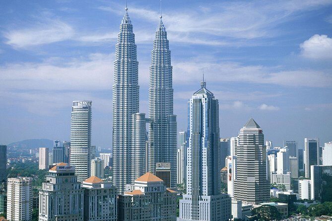 Kuala Lumpur Half-day City Tour - National Mosque (Masjid Negara): iconic form near the lake gardens