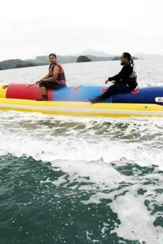 Langkawi: Cenang Beach Side Activities - Parasailing from a boat: a calmer feeling above the waves