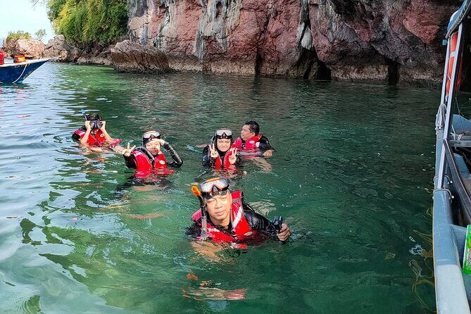 Langkawi Tour A - Land Tour & Pulau Dangli Snorkeling - Pantai Cenang: Sunset Energy on the Long Beach