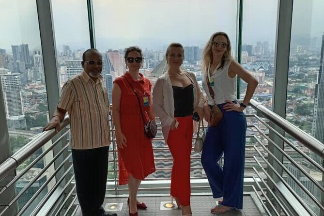 Petronas Twin Tower Skybridge View & Dining Experience Tour with Local Host - Snacks and tea: a small inclusion that makes the view feel complete