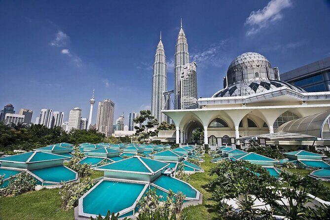Private FullDay Tour includes Petronas Twin Towers & Batu Caves - Chinatown, Central Market, and Merdeka Square: the KL day’s flavor stops
