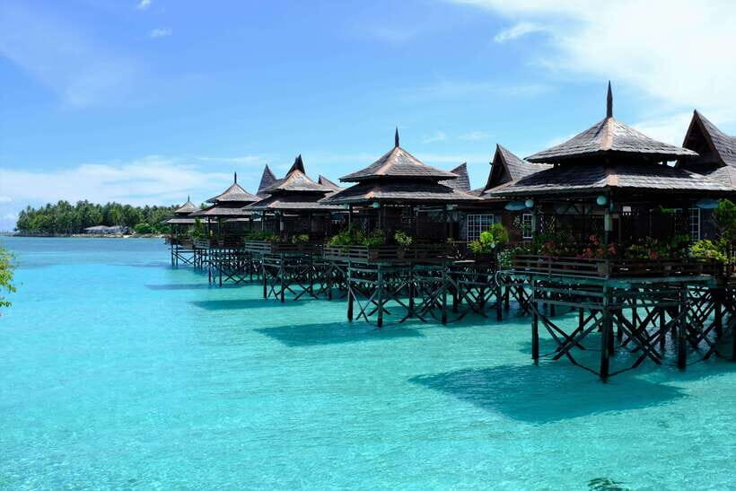 Semporna: Mabul and Kapalai Trip in Snorkel or Dive & Lunch - Mabul Water Bungalows: where the water-village meets your camera roll