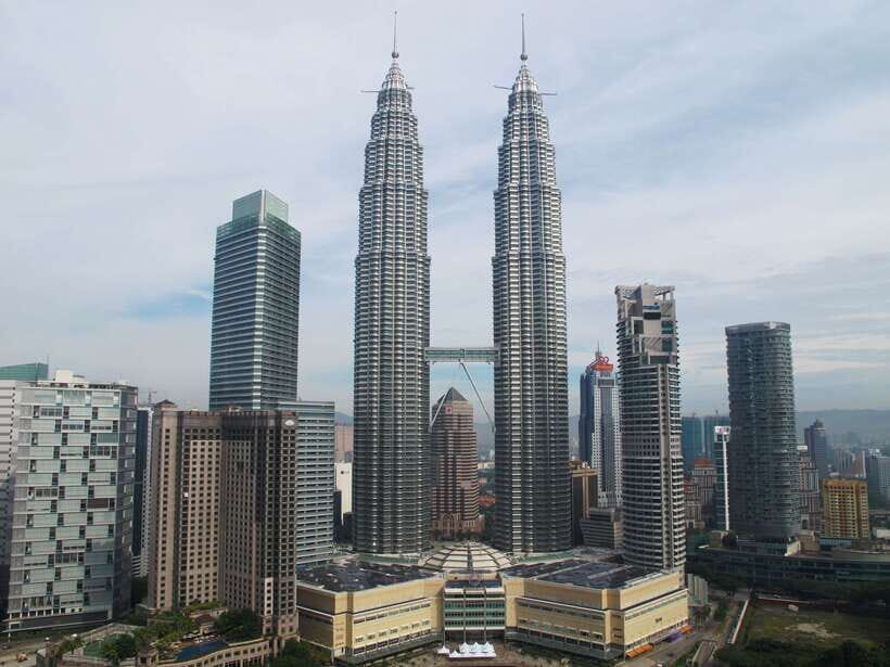 The Great Kuala Lumpur Tour with KL Tower Ticket & Lunch - Batu Caves: 272 steps, 400-million-year rock, and temple rules
